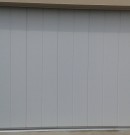 porte de garage sectionnelle coulissante latérale blanche - pleine et rainures M