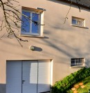 porte de garage sectionnelle plafond avec portillon incorporé - teinte blanc